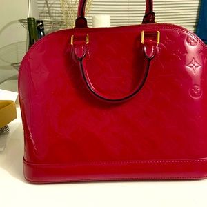 LV alma pm size red in excellent condition, pre own